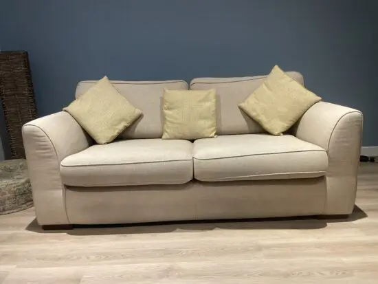 One two piece suite and One single chair