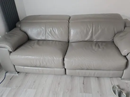 Sofology grey power recliner and heads headsraints very good condition