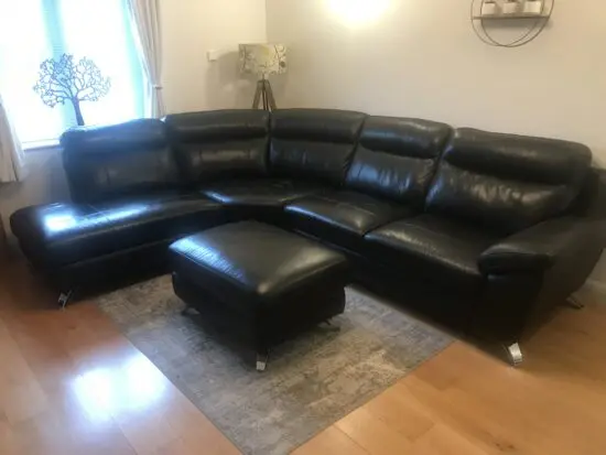 Large DFS black leather corner sofa