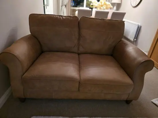 Tan leather next 3 seater + 2 seater + footstool