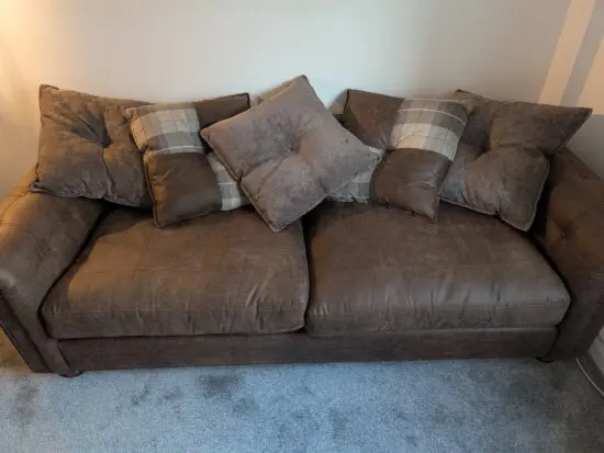 2 piece brown shaggy faux leather sofas. Mint condition