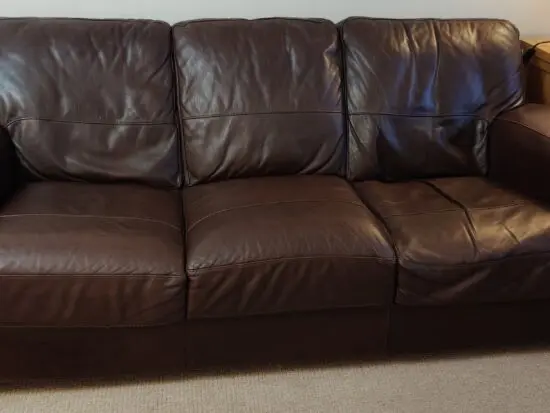 DFS Brown leather 3 seater sofa