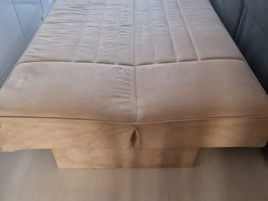 Two identical click-clack sofa beds with two storages for bedding