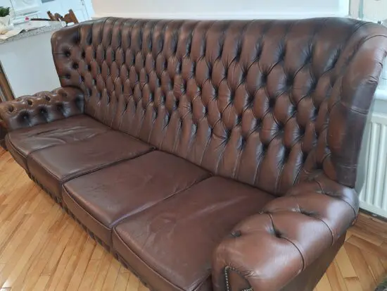 Leather 4 seater wingback settee and matching. Mechanical reclining chair. Saxon Leather