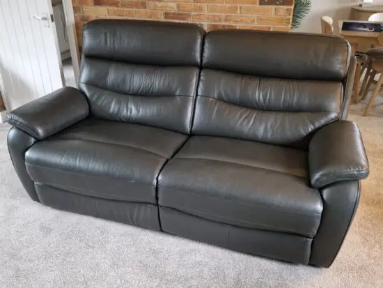 Charcoal grey leather 3 seater sofa and chair. Fully electric reclining with electric head cushion tilt