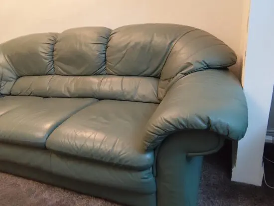 Harveys green leather sofa set. 3 seater, 2 armchairs and footstool.