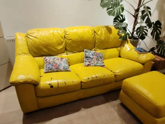 Vintage style yellow comfy leather sofa
