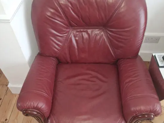 2 Reclining burgundy Leather chairs