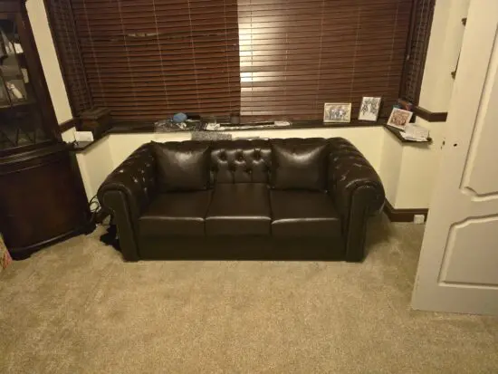 Brown Chesterfield sofa