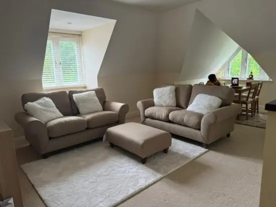 DFS Evelyn x2 two seater sofa and footstool in a latte colour