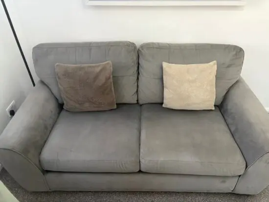 2 DFS Grey Velvet 2 seater sofas plus matching footstool