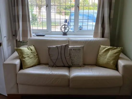 Furniture Village Modern Cream Leather 3 seater sofabed