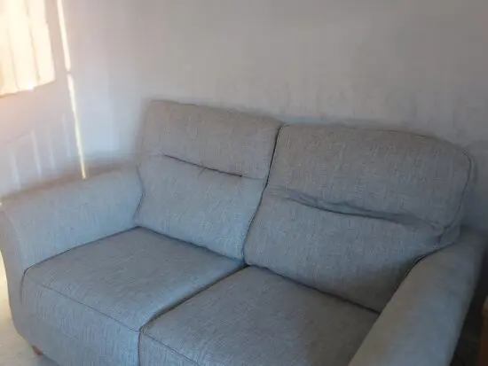 Harvey's furniture store grey/blue 2 two seater sofas with wooden feet