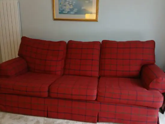 Predominately red with navy and green as a large check