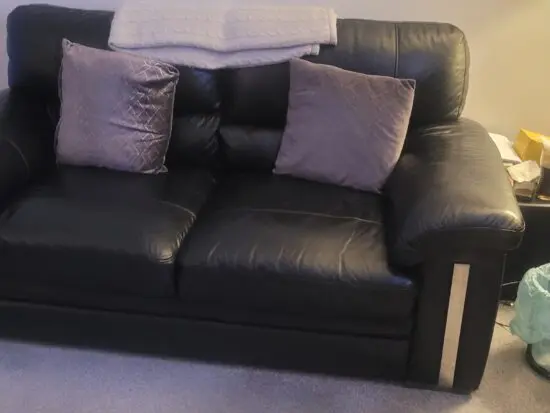 scs black leather 2 seater sofa