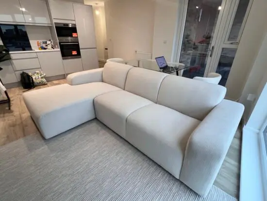 Cream sofa (stage furniture item)