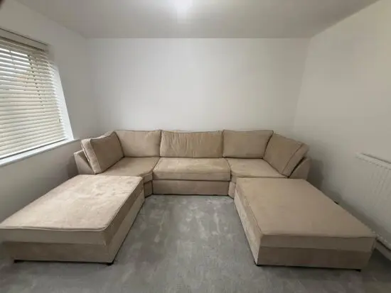 Beige u shape sofa