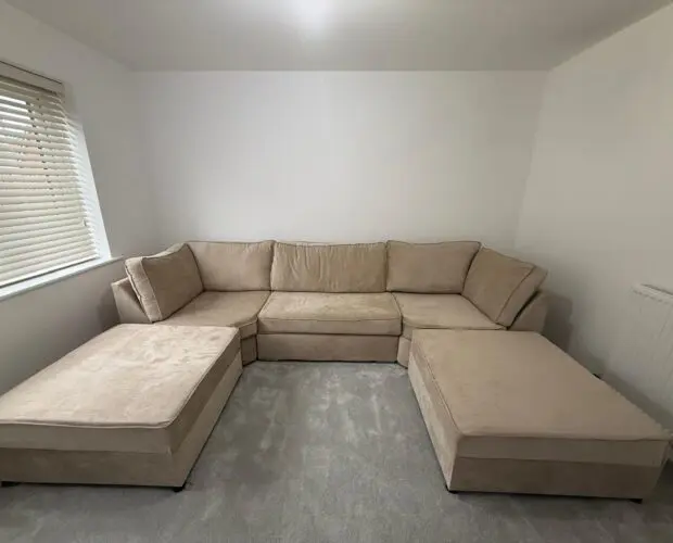 Beige u shape sofa
