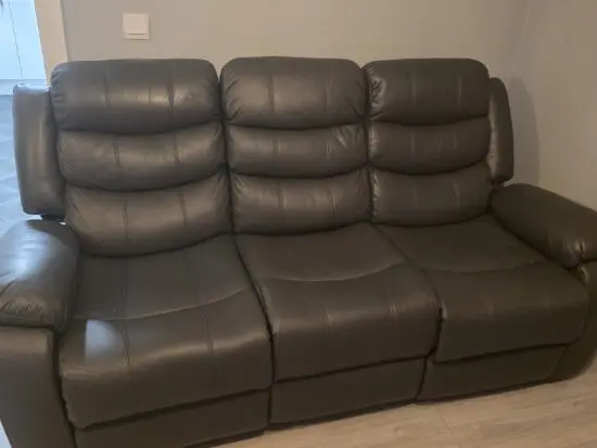 Grey 3 seater recliner sofa with cup holders