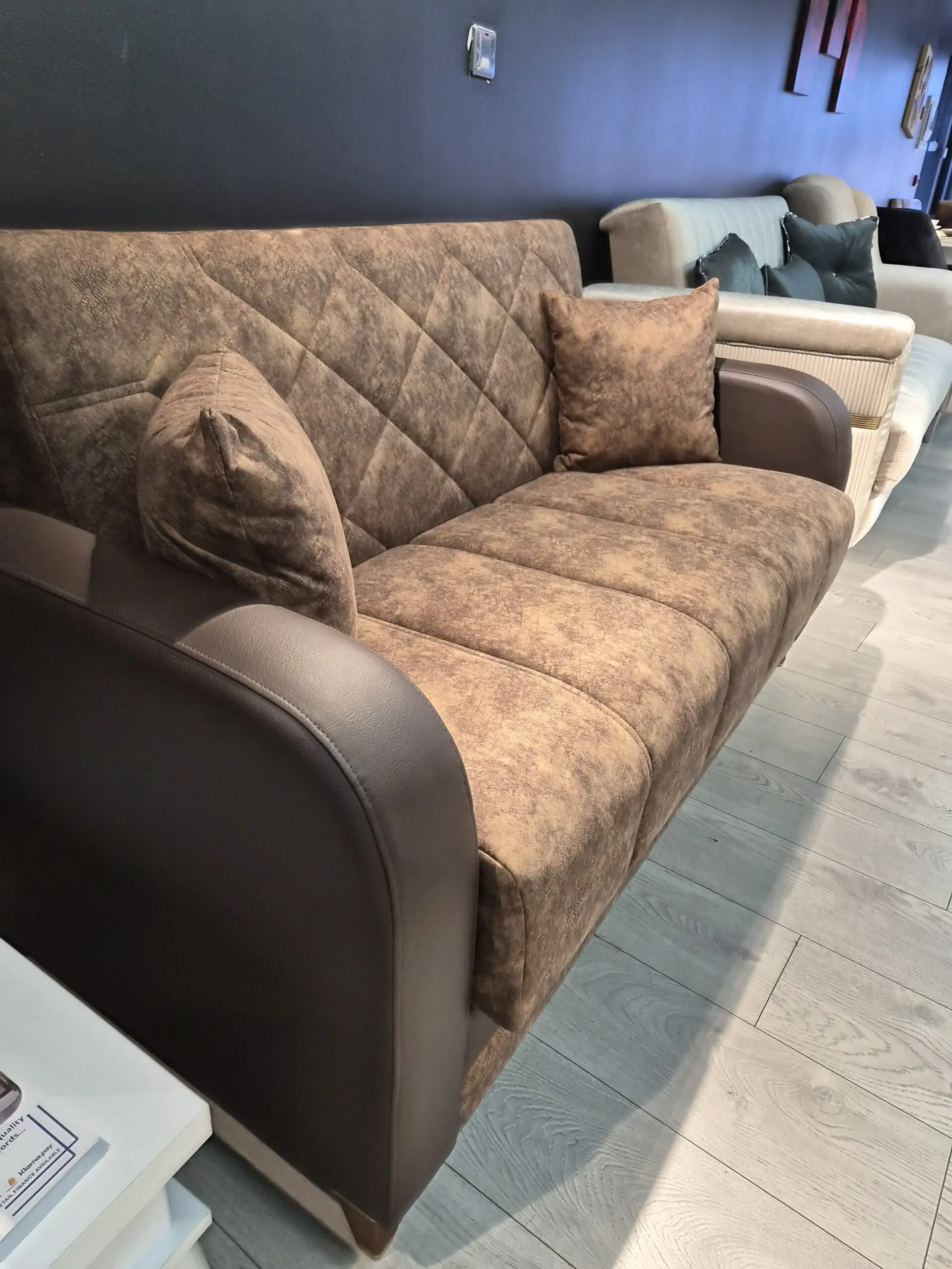 2 seater brown sofa brand new with leather arms