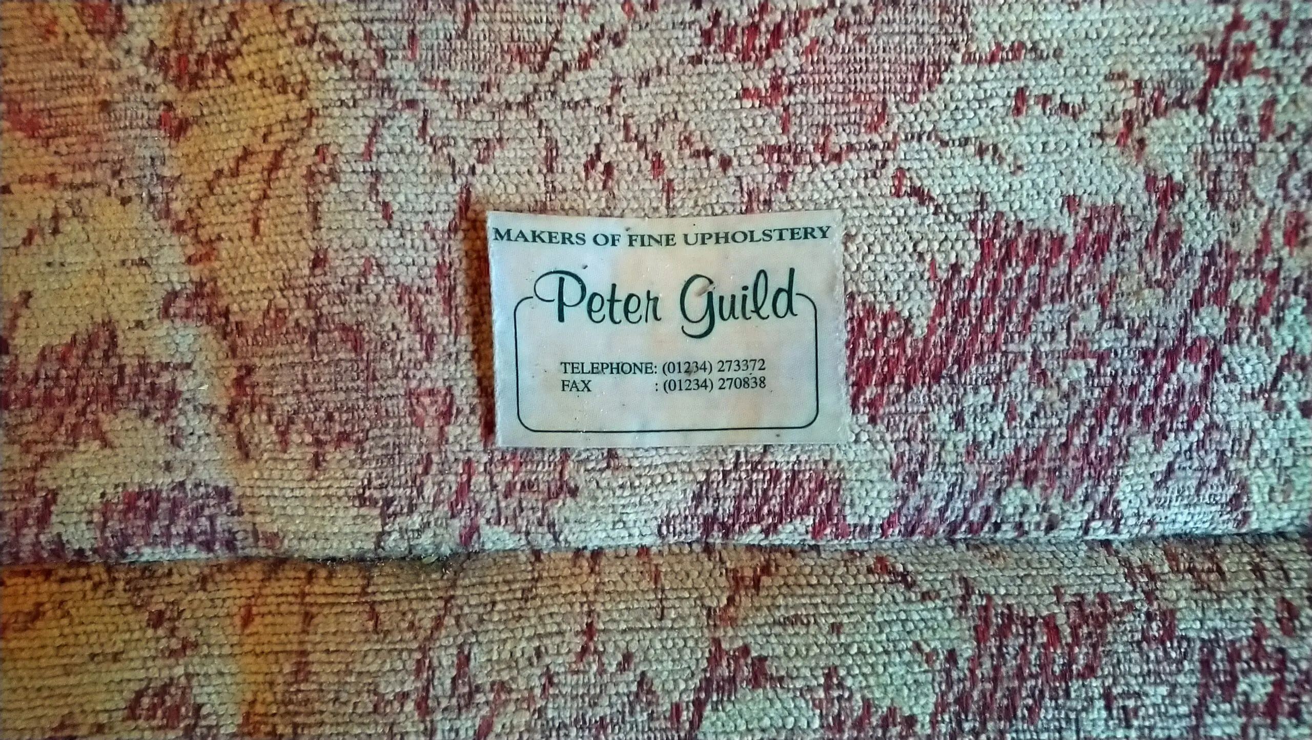 Velvet scroll arm settee