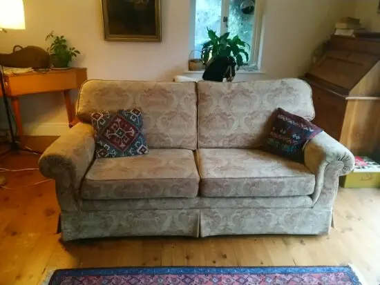 Velvet scroll arm settee