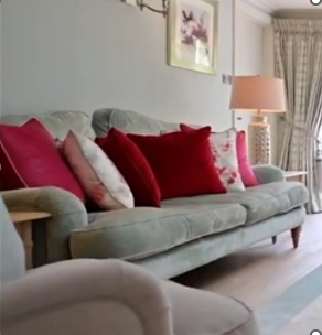 2 lovely Laura Ashley Lynden velvet looking green 3 seater sofas and matching pouf