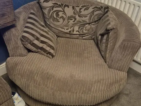 Dfs brown swivel chair and half moon foot rest