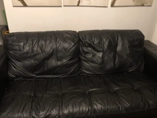 3 and 2 seater leather sofa plus foot stool