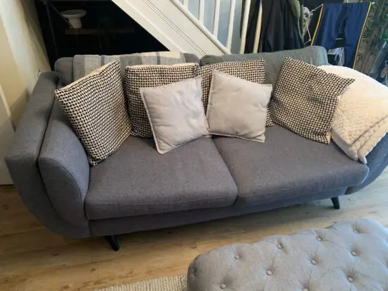 2 seater grey sofa & Footstool