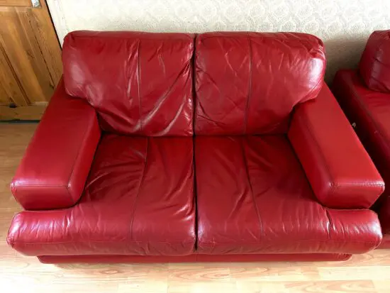 DFS Two-Seater Red Leather Sofa