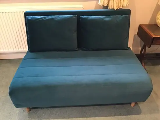 M & S dark green sofa bed