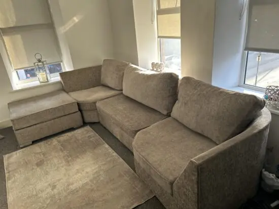 Taupe sofa with removable pouffe