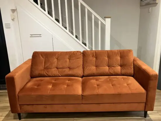 3 seater orange sofa