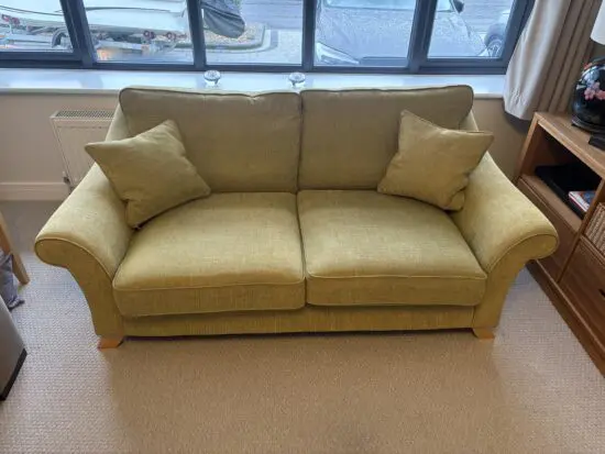 Green 2 seater sofa