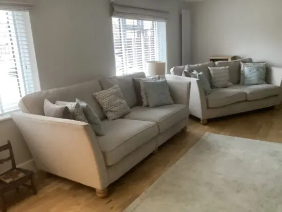 Two Oatmeal/beige Oak furniture land sofas