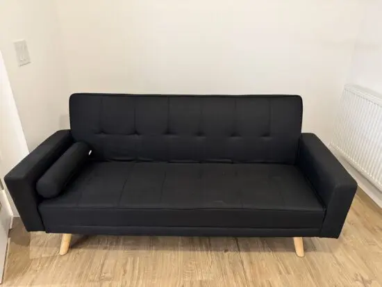 Black convertible sofa bed by Mercury Row