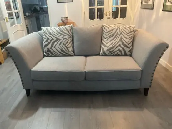 Grey two/three seater settee