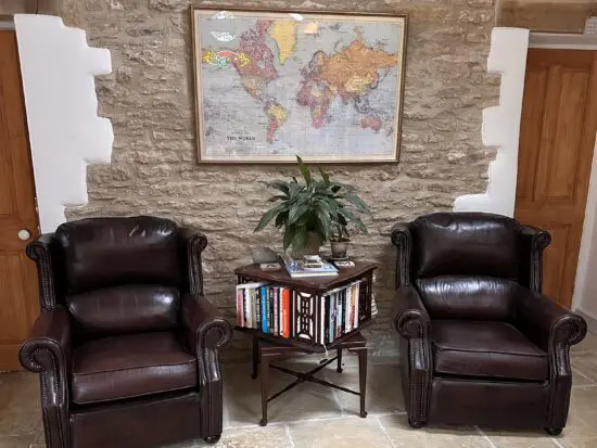 2 Thomas Lloyd leather armchairs- great condition