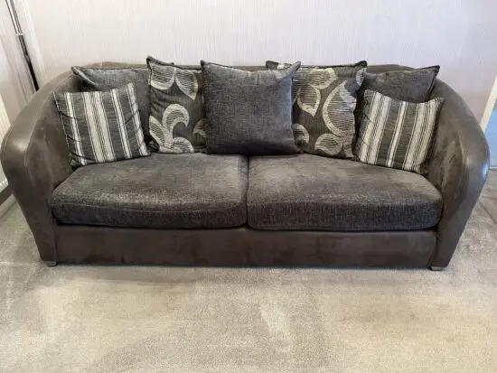 DFS fabric/suede grey sofa and cuddle chair