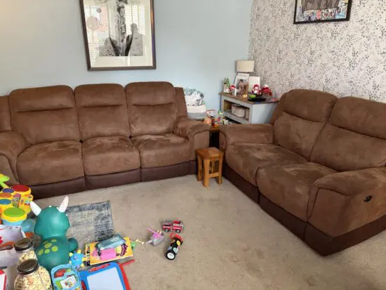 2 brown electric reclining sofas from DFS