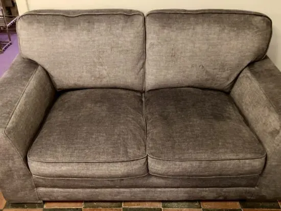 Lovely grey 2-seater sofa.