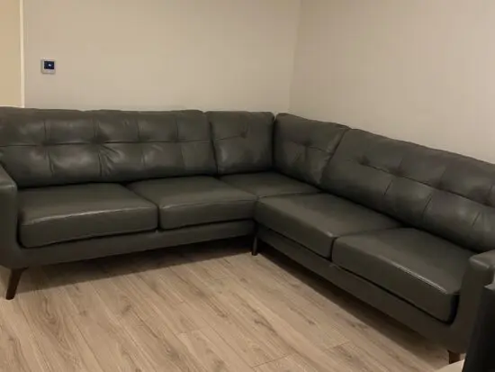 John Lewis Grey Barbican leather 5+seater with matching footstool