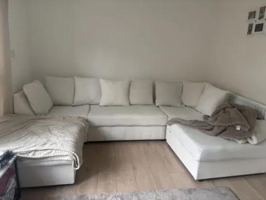 Cream U shape sofa