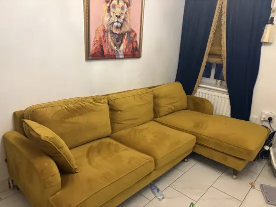 Mustard gold corner sofa left facing The Payton L-shaped sofa accommodates up to four people comfortably, and the chaise section is perfect for lounging and putting your feet up on. It includes two matching scatter cushions for added comfort, and the dark wood legs with gold castors complete the modern look. Assembly is simple, just slot the two pieces together and screw in the legs. The back and seat cushions can be removed for regular plumping, ensuring your sofa maintains maximum comfort. Light oak legs are available to purchase on this product, just add yours from our package deals, recommended accessories or at checkout. All Payton products are delivered with dark wood legs as standard. Need to know Dimensions: W256 x D151 x H85 cm Weight: 74 kg Max supported weight: 100 kg per seat Seats: 4 people Colour: Olive green Finish: Upholstered Material: Velvet fabric Frame: Solid plywood and eucalyptus wood Assembly required: Yes – just slot both pieces together and attach the legs