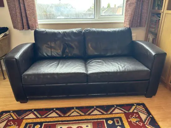 Dark brown leather sofa bed
