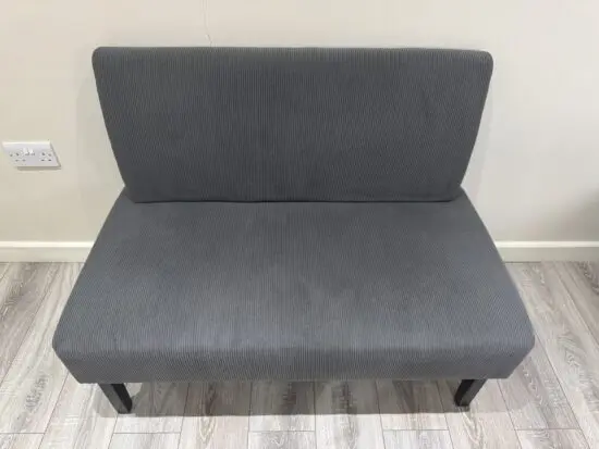Armless 2 seater sofa grey velvet