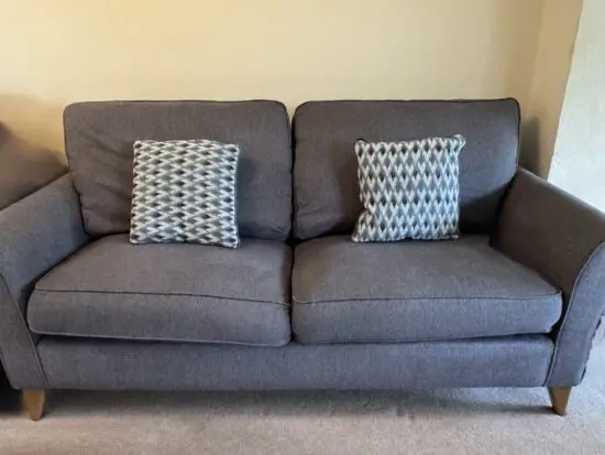 OakFurnitureland Jasmine 3 Seater Sofa in Orkney Fabric - Graphite with Newton Ocean Scatters