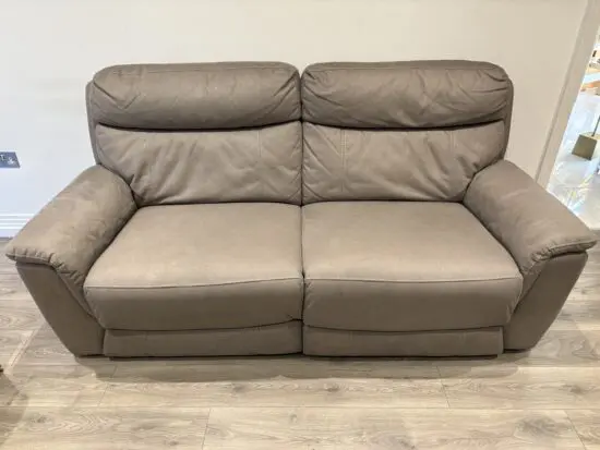 Grey suede three seater recliner sofa