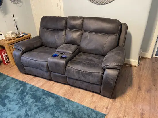 DFS charcoal 2 seat reclining sofa